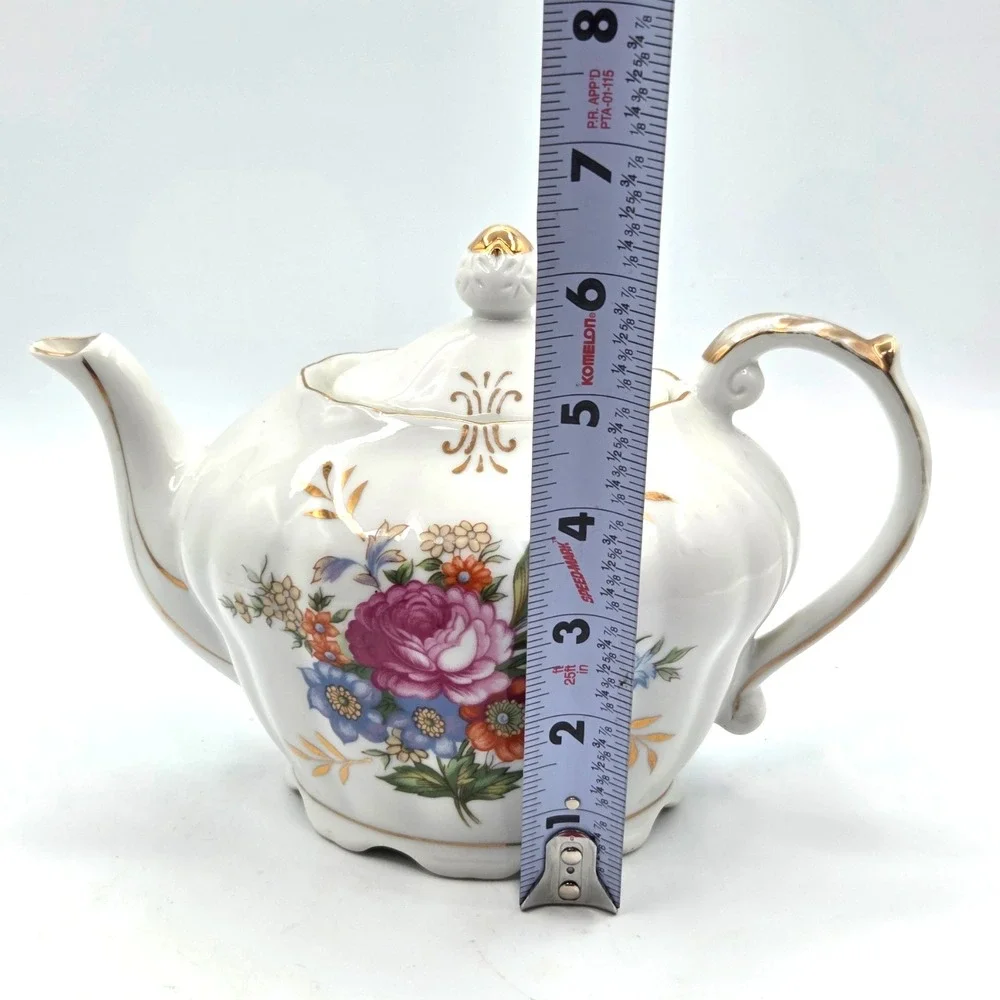 Porcelain Musical Teapot Plays 